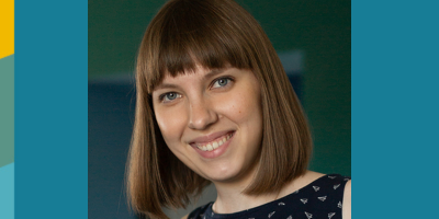 Porträt Frau mit braunen kinnlangen Haaren vor unscharfem Hintergrund. Es handelt sich dabei um Elena Kirshanova.