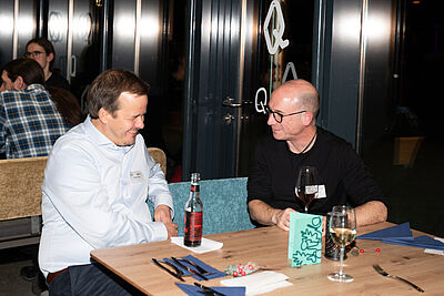 Alumnus Timm Korte and Prof. Thorsten Holz at the Alumni Colloquium followed by the Christmas party in December 2025.